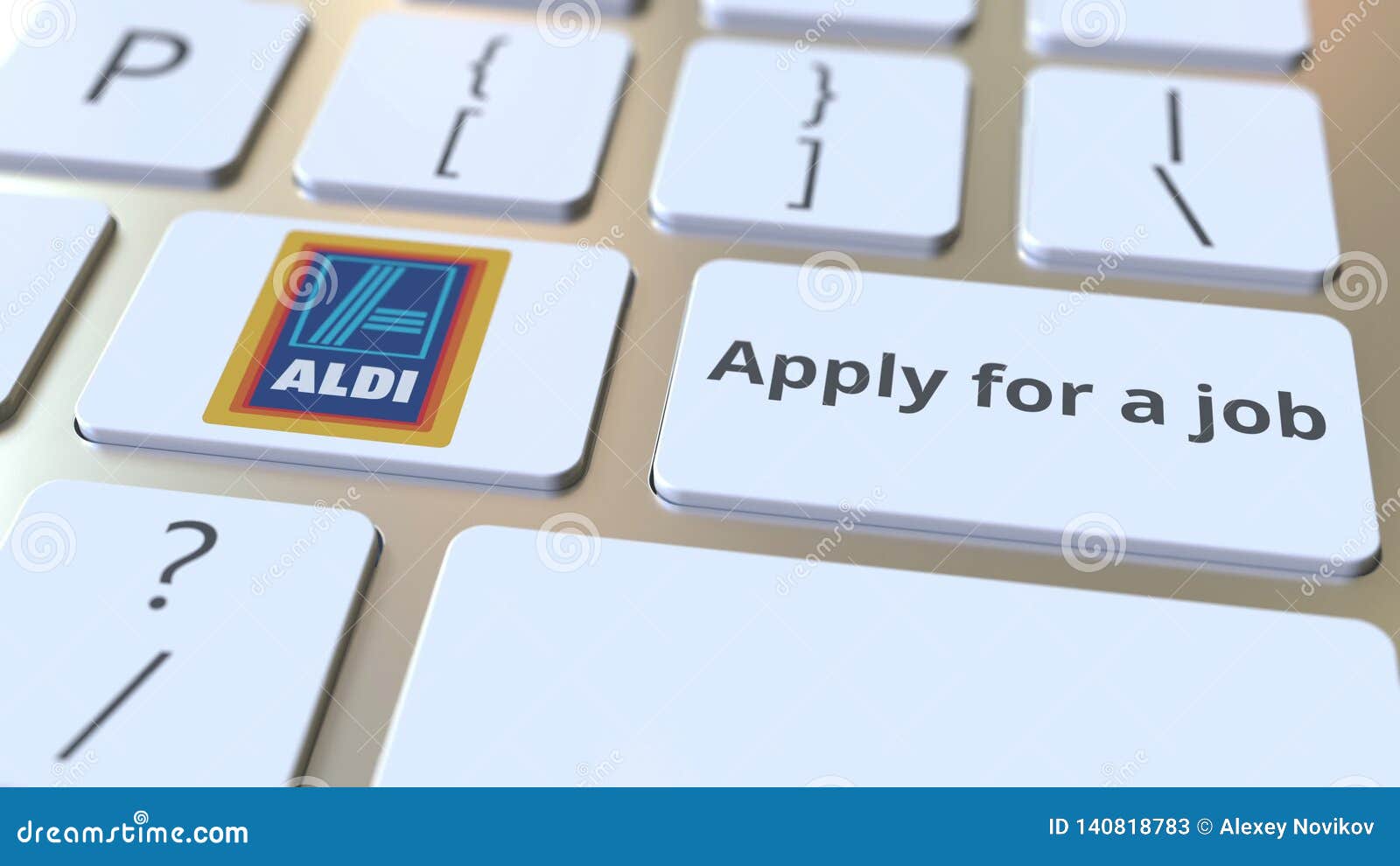 ALDI Company Logo and Apply for a Job Text on the Keys of the Computer