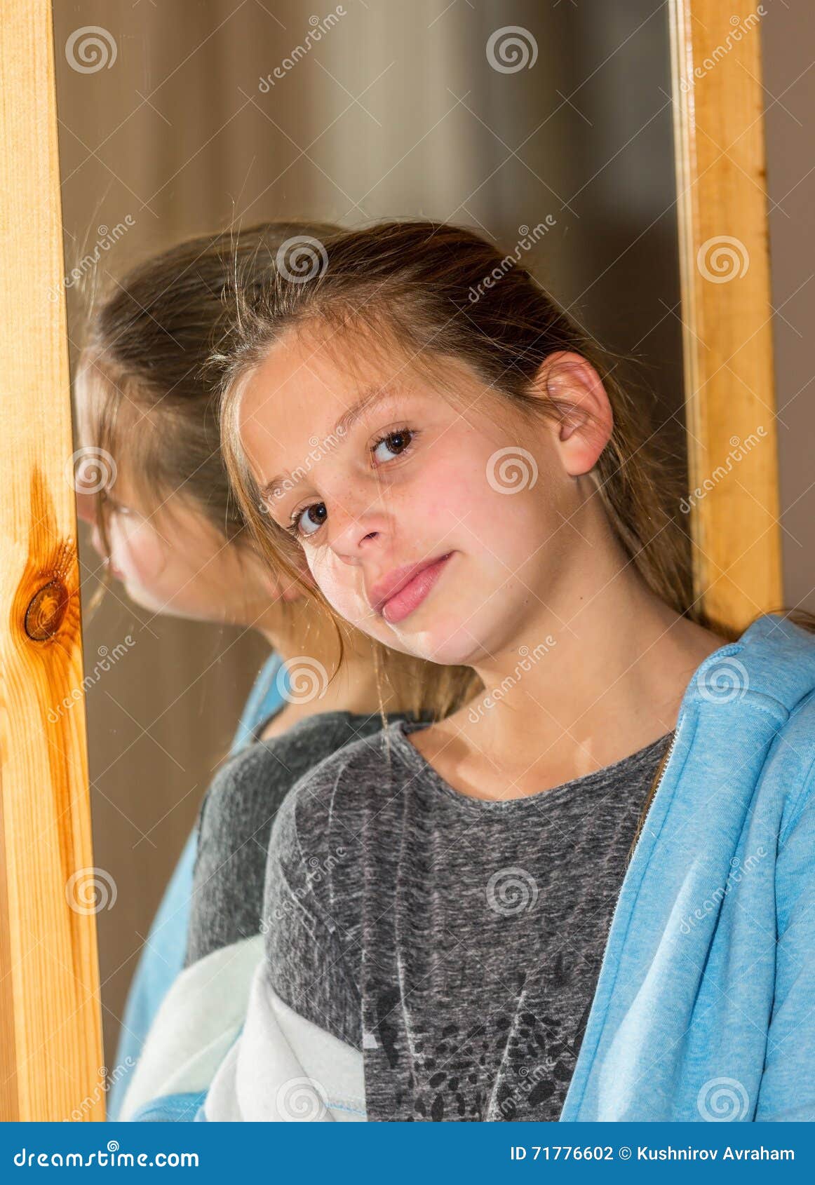 Alice Leaned Against the Mirror Stock Photo Image of face