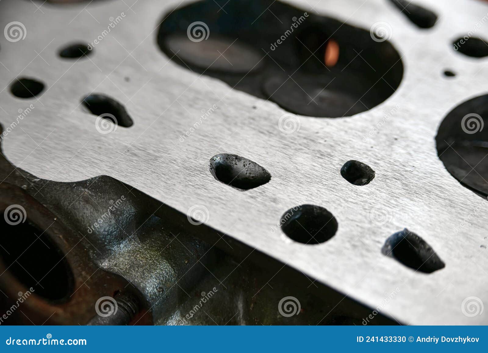 Aligned and Ground Cylinder Head with an Abrasive Stone on a Surface