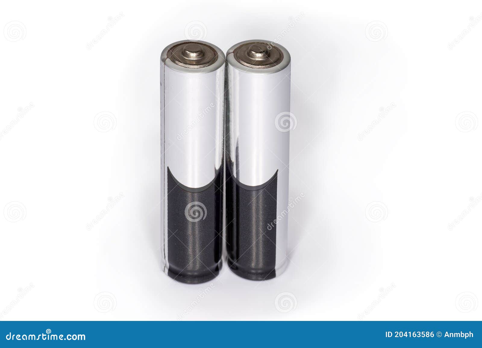 Alkaline AAA Batteries on a White Background Closeup Stock Photo