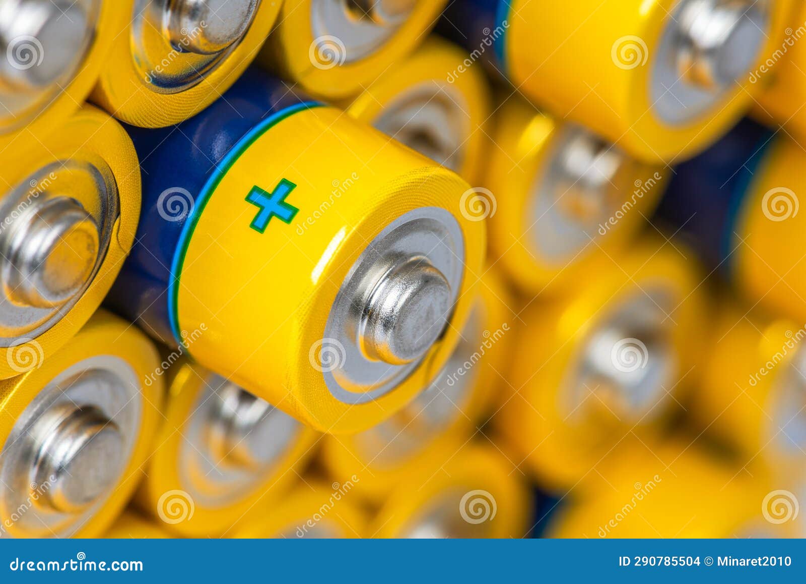 Alkaline Batteries in with Focus on One of Them Stock Photo Image of