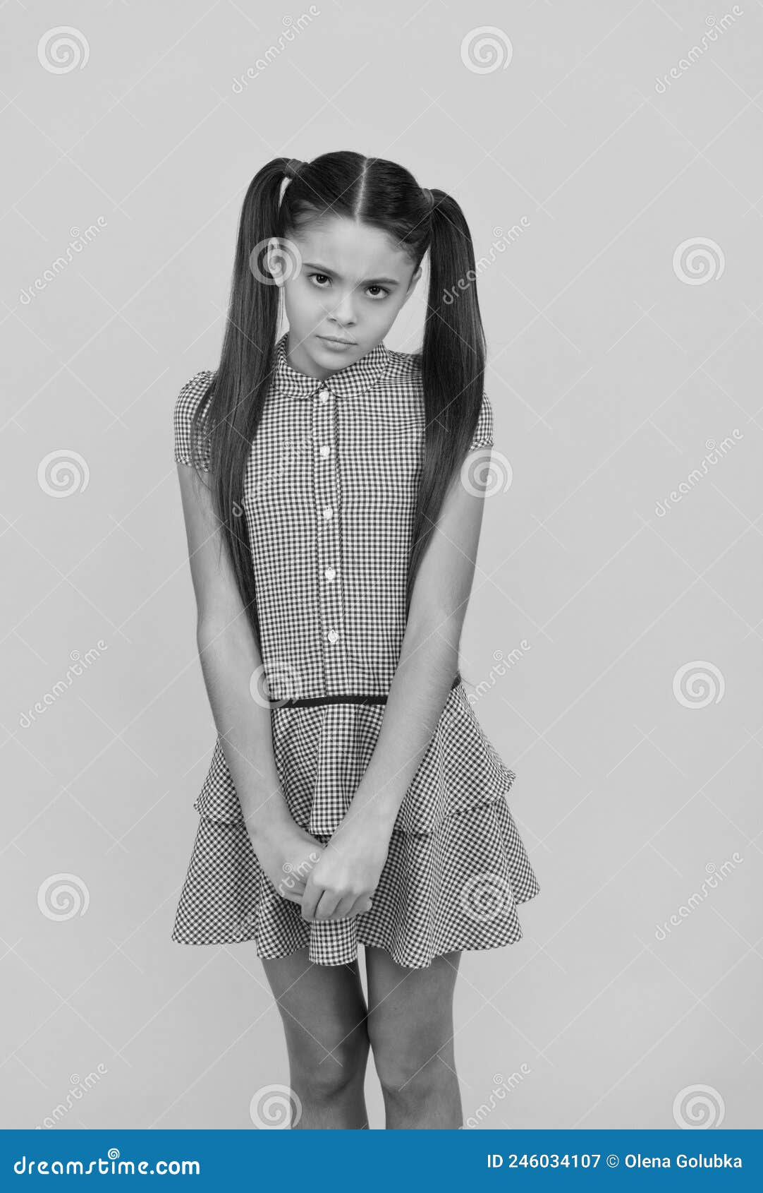 all the taste of being a girl. shy girl in dress yellow background. girlhood and childhood