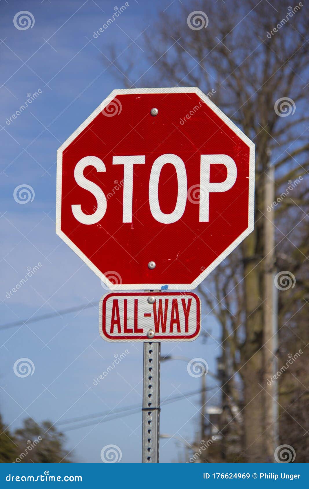 all-way stop sign on a metal pole