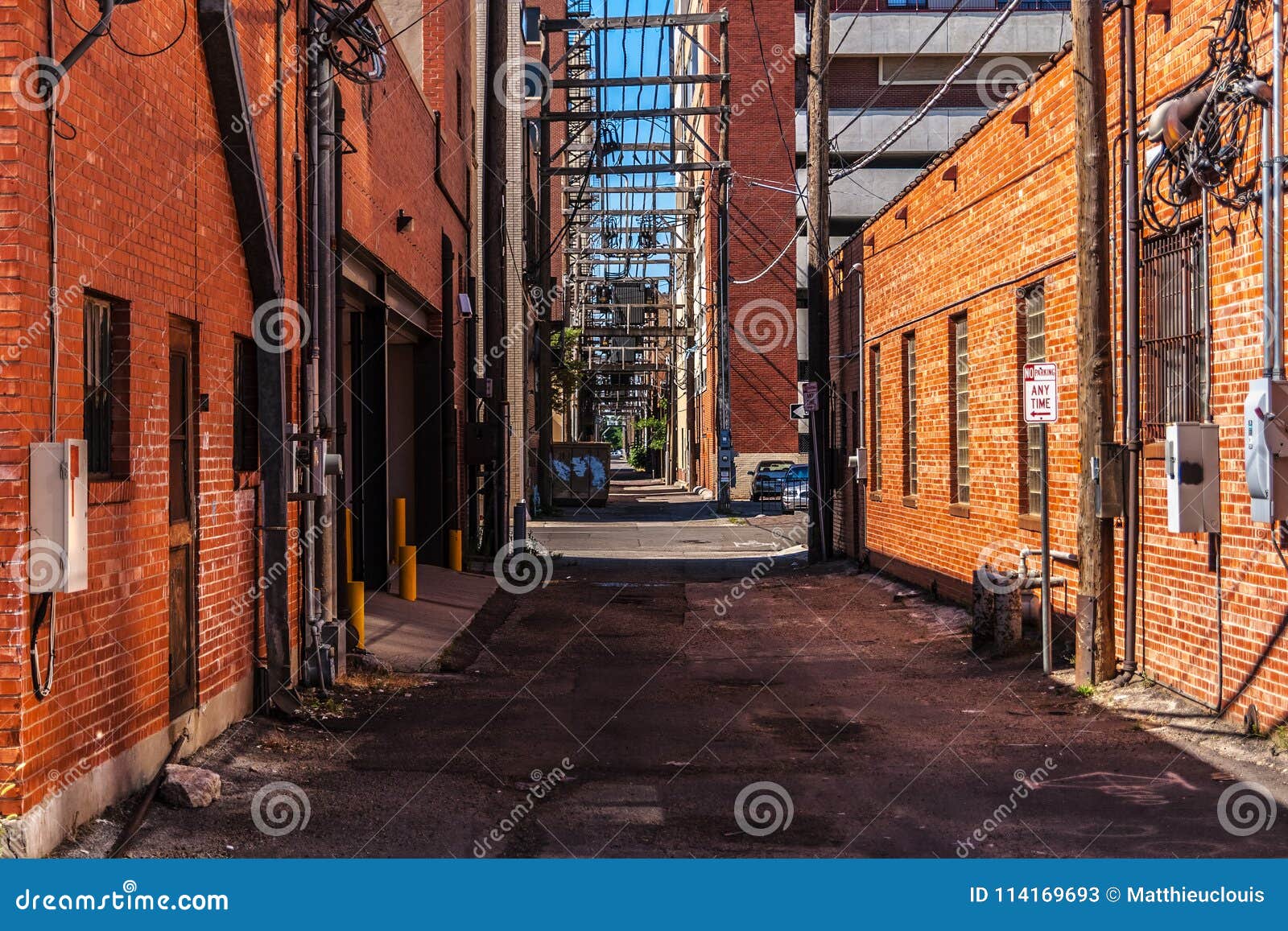 an alley with red brick buildings in amarillo