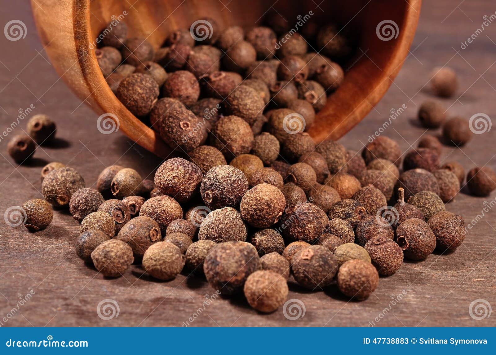 Allspice in a bowl stock image. Image of eating, aroma 47738883