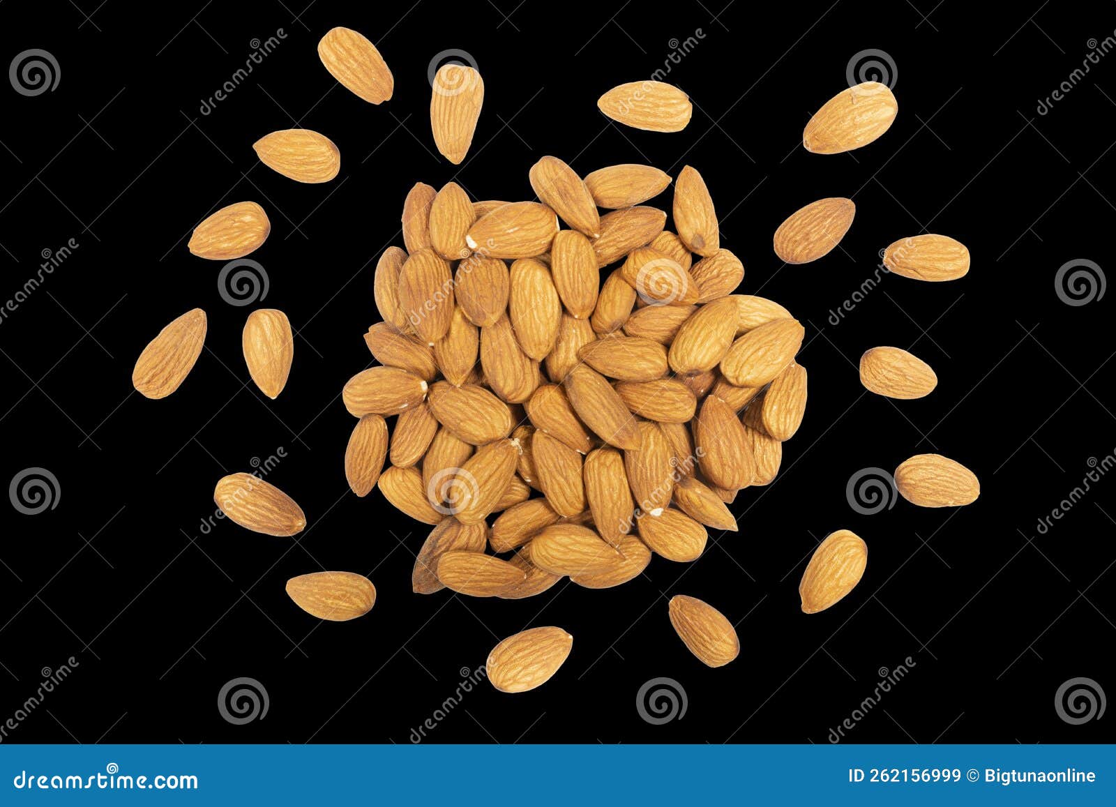 almond background close up  on black background.. macro shot fresh almonds nuts overblack. almond texture closeup