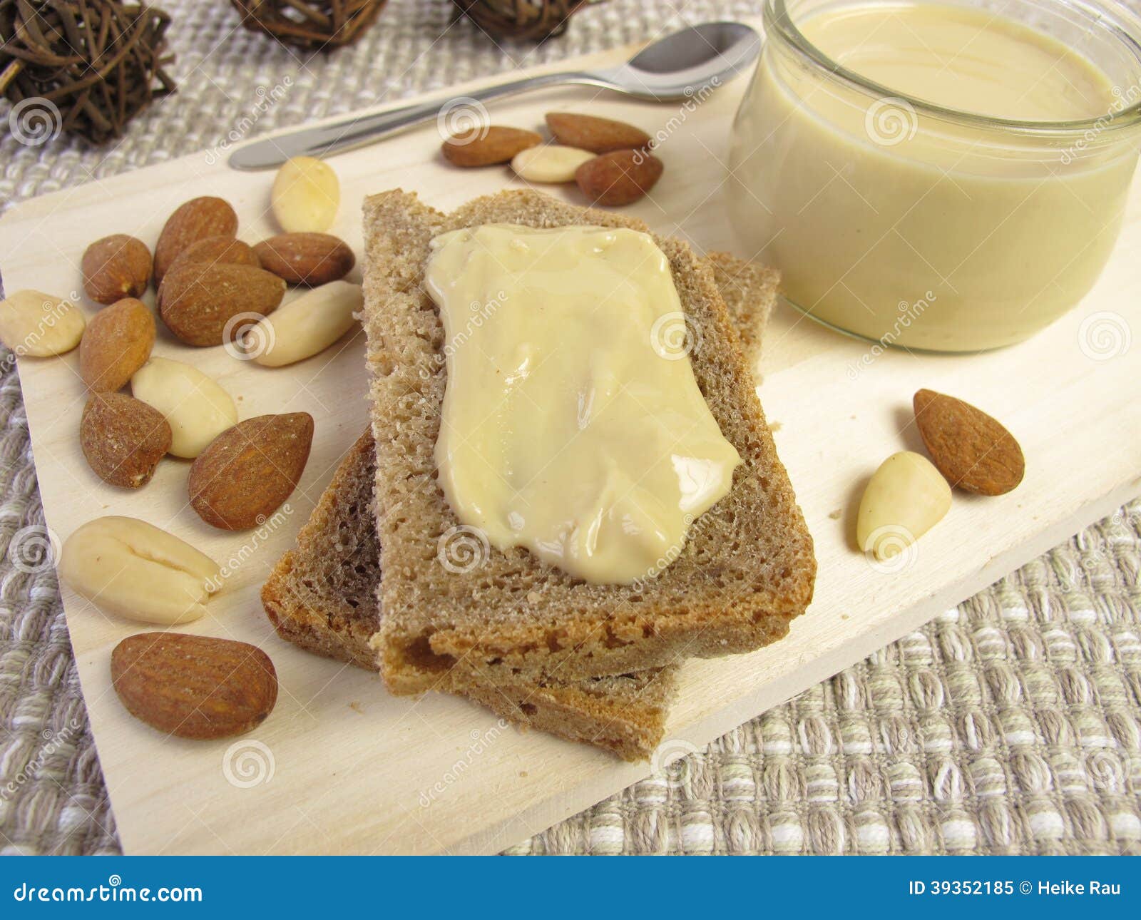 Almond butter on bread stock image. Image of spread, veggie 39352185