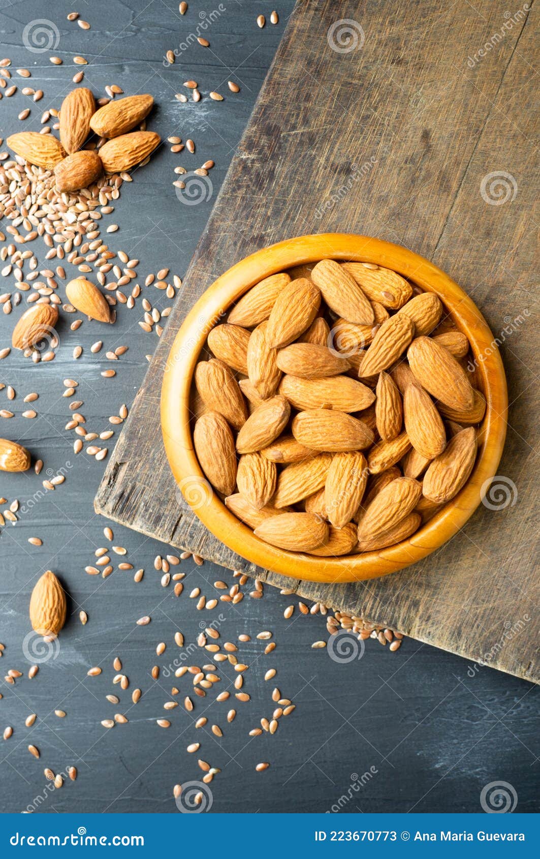 Almonds over cutting board stock image. Image of food 223670773