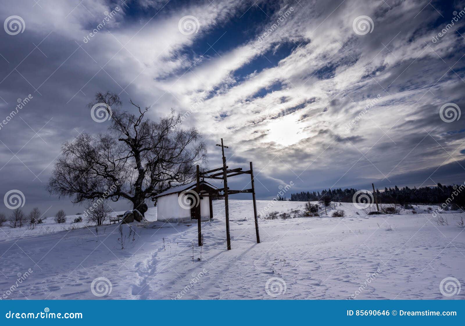 Alone near the fait snow. Alone capel in snow time