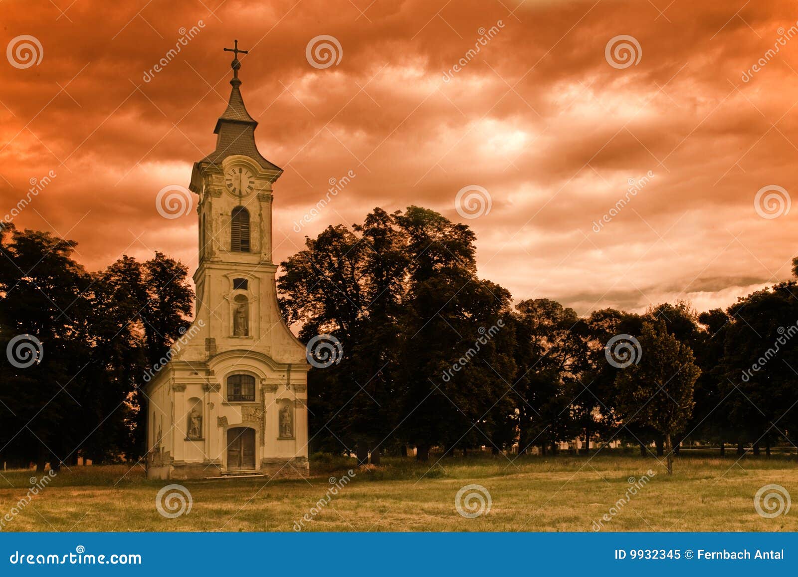 Alone in the storm. Old abandoned church at the end of a village