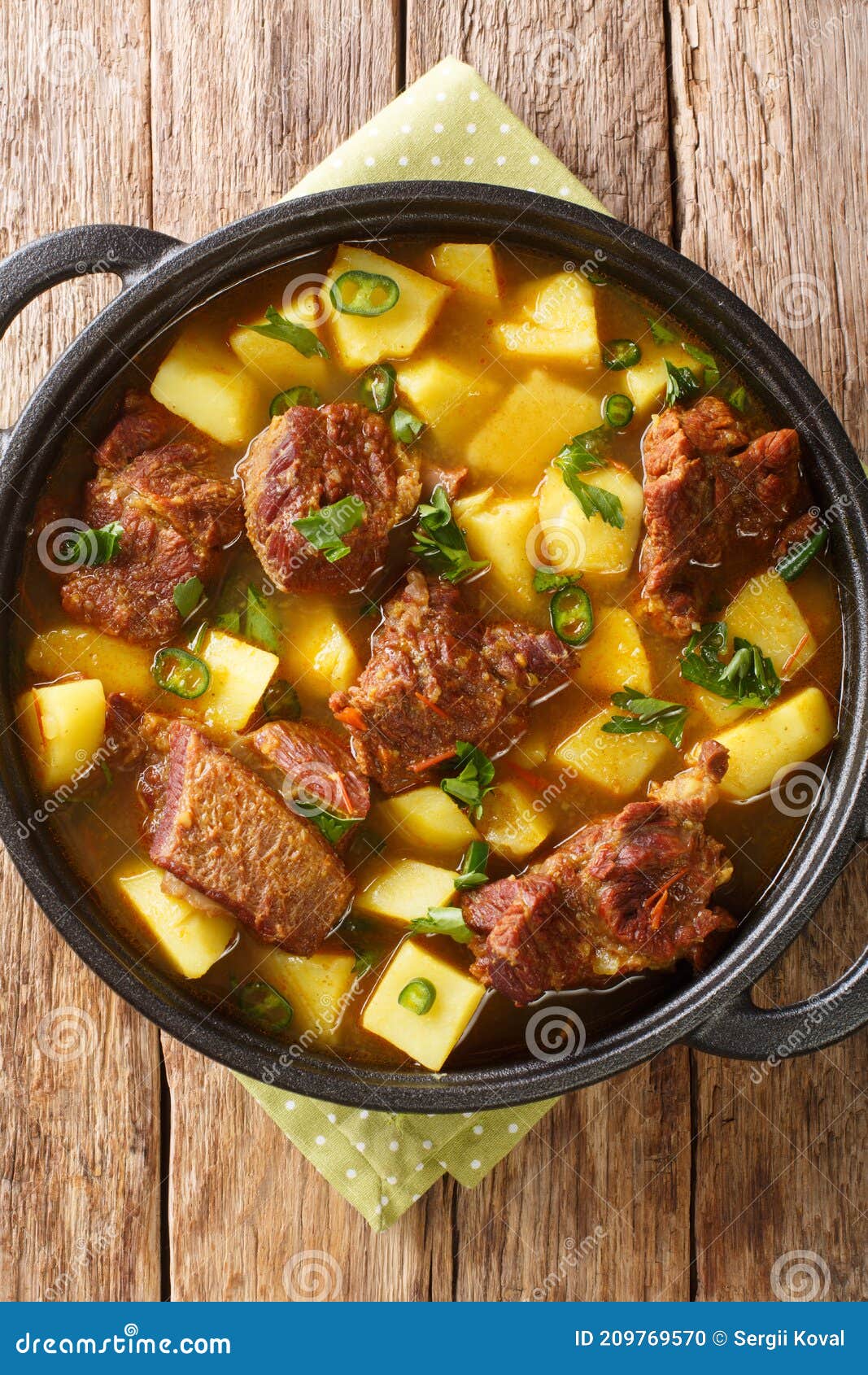Aloo Gosht Pakistani Beef and Potato Stew Closeup in the Pan. Vertical ...