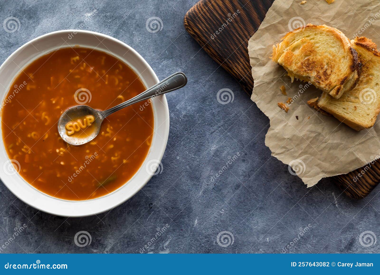 Alphabet Soup With The Word Soup In The Spoon Served With Grilled alphabet-soup-with-the-word-soup-in-the-spoon-served-with-grilled