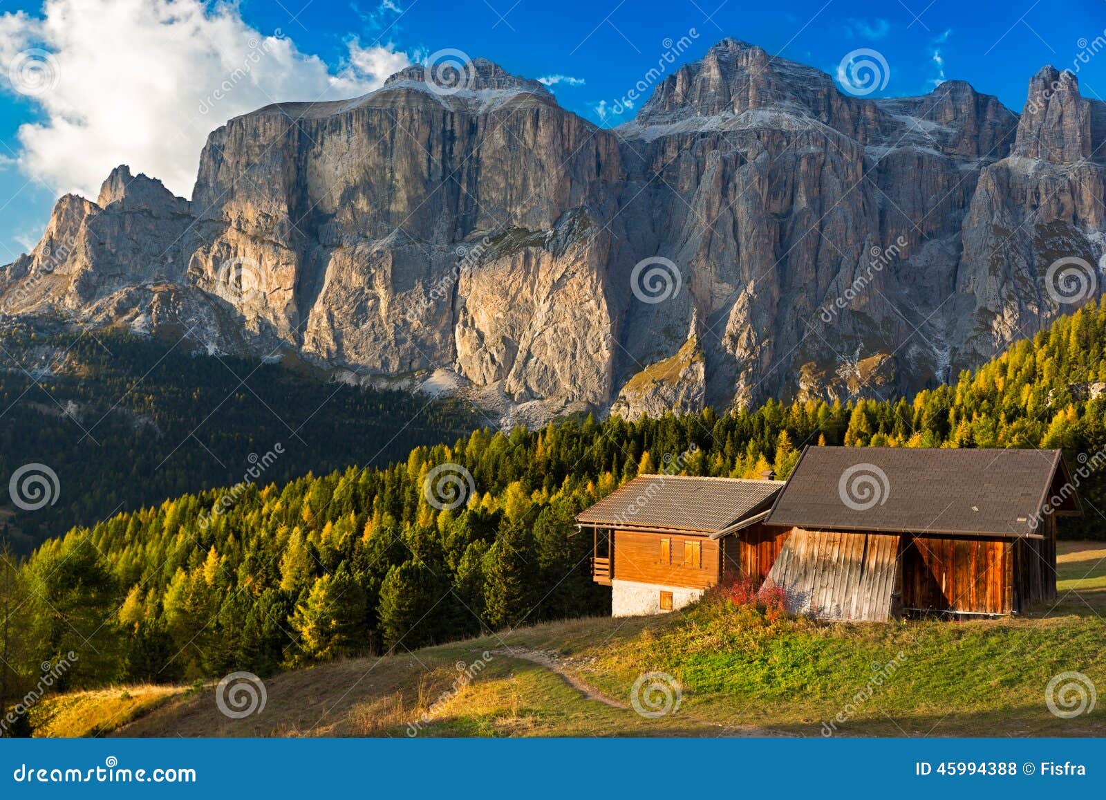 alpin hut at passo pordoi with sella group, dolomites, italian a