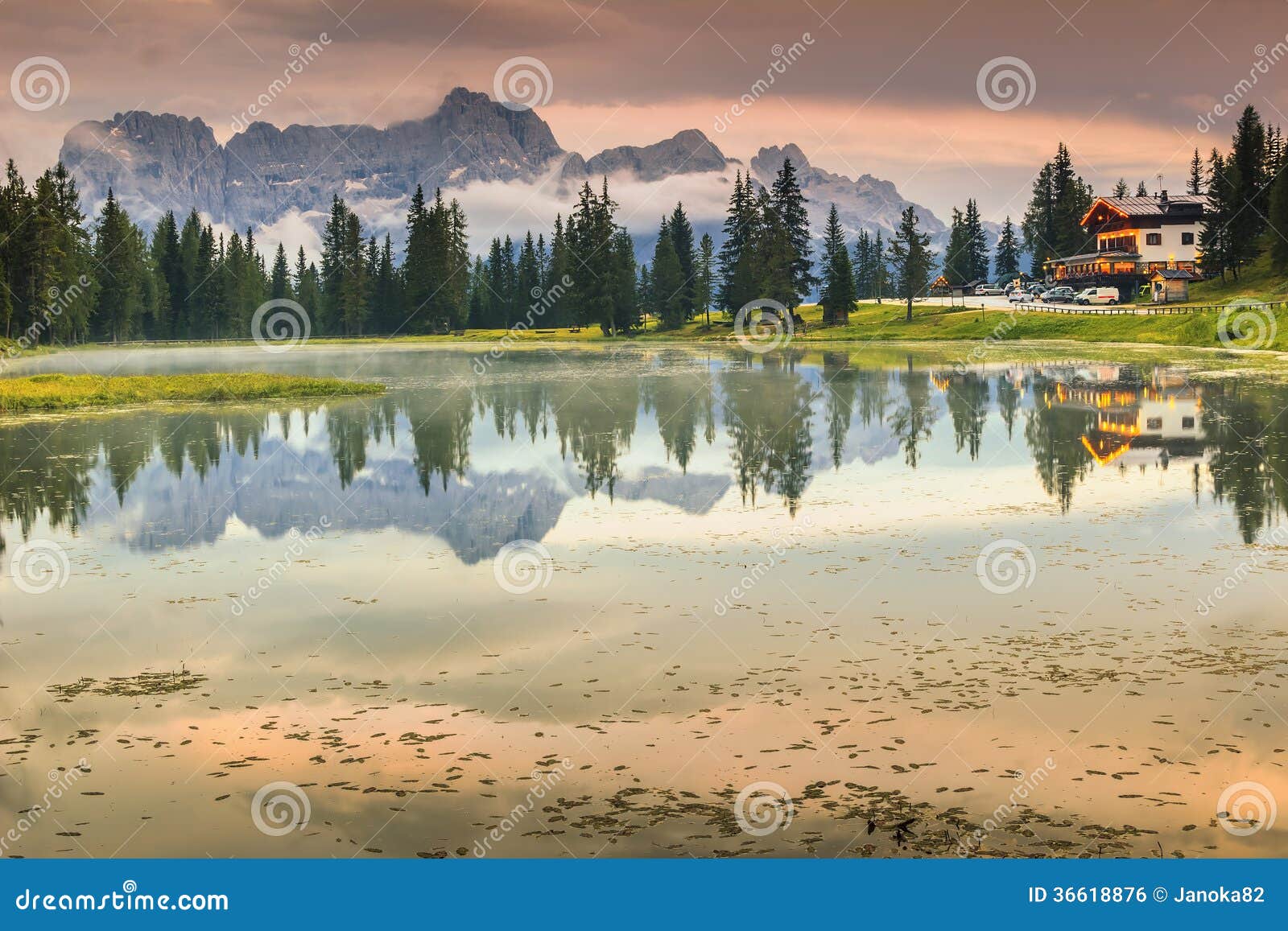 alpine lake in dolomites and sorapis mountain group,lago di antorno