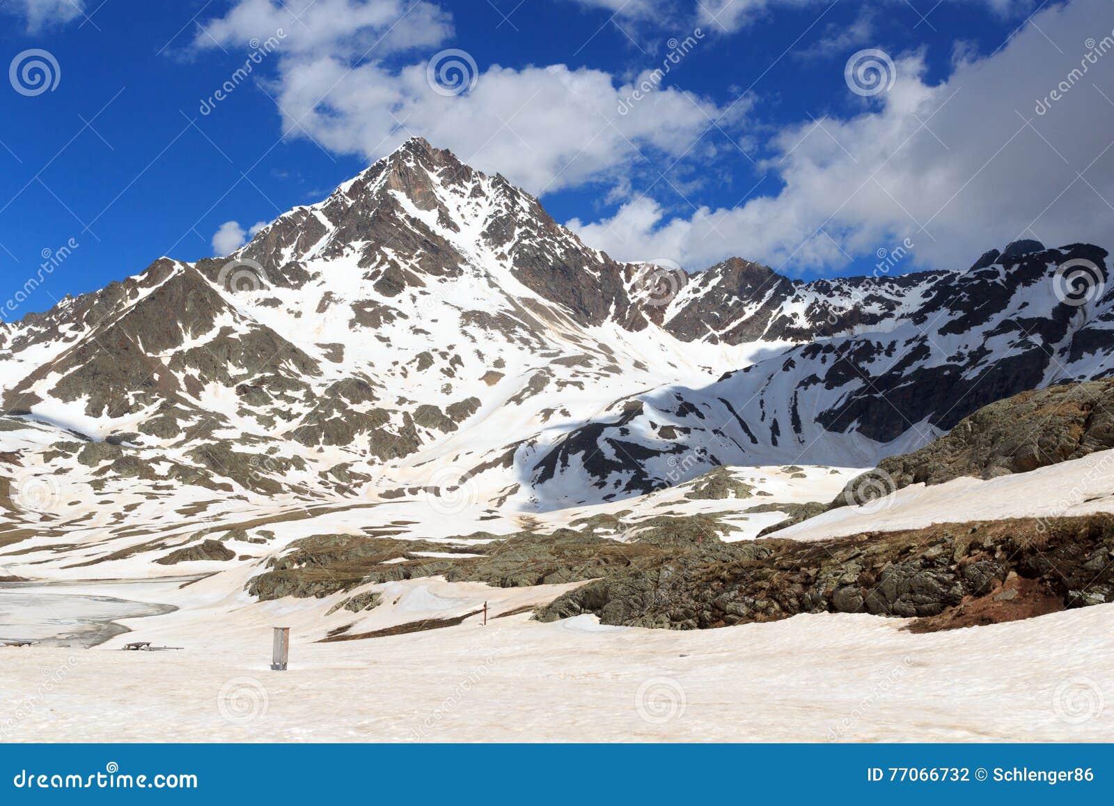 alpine mountain corno dei tre signori and snowfield in stelvio national park