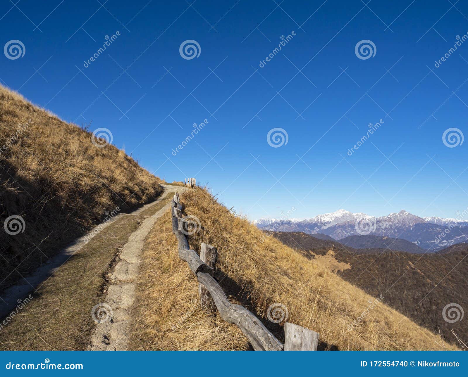 alpine trail on mount bolettone in the italian alps