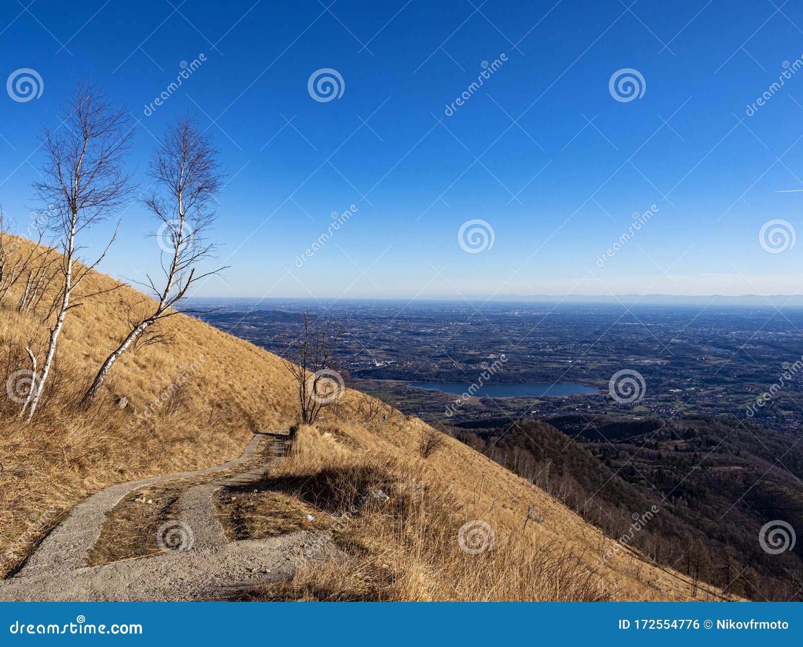 alpine trail on mount bolettone in the italian alps