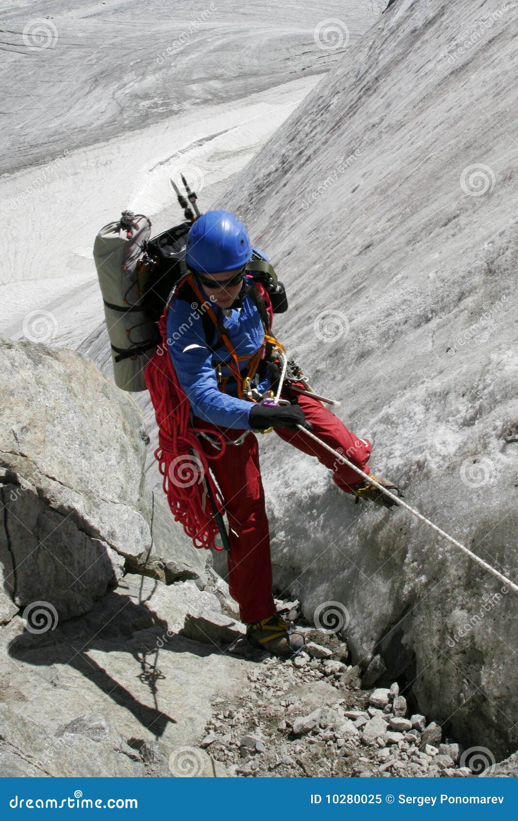 alpinist on glacier.