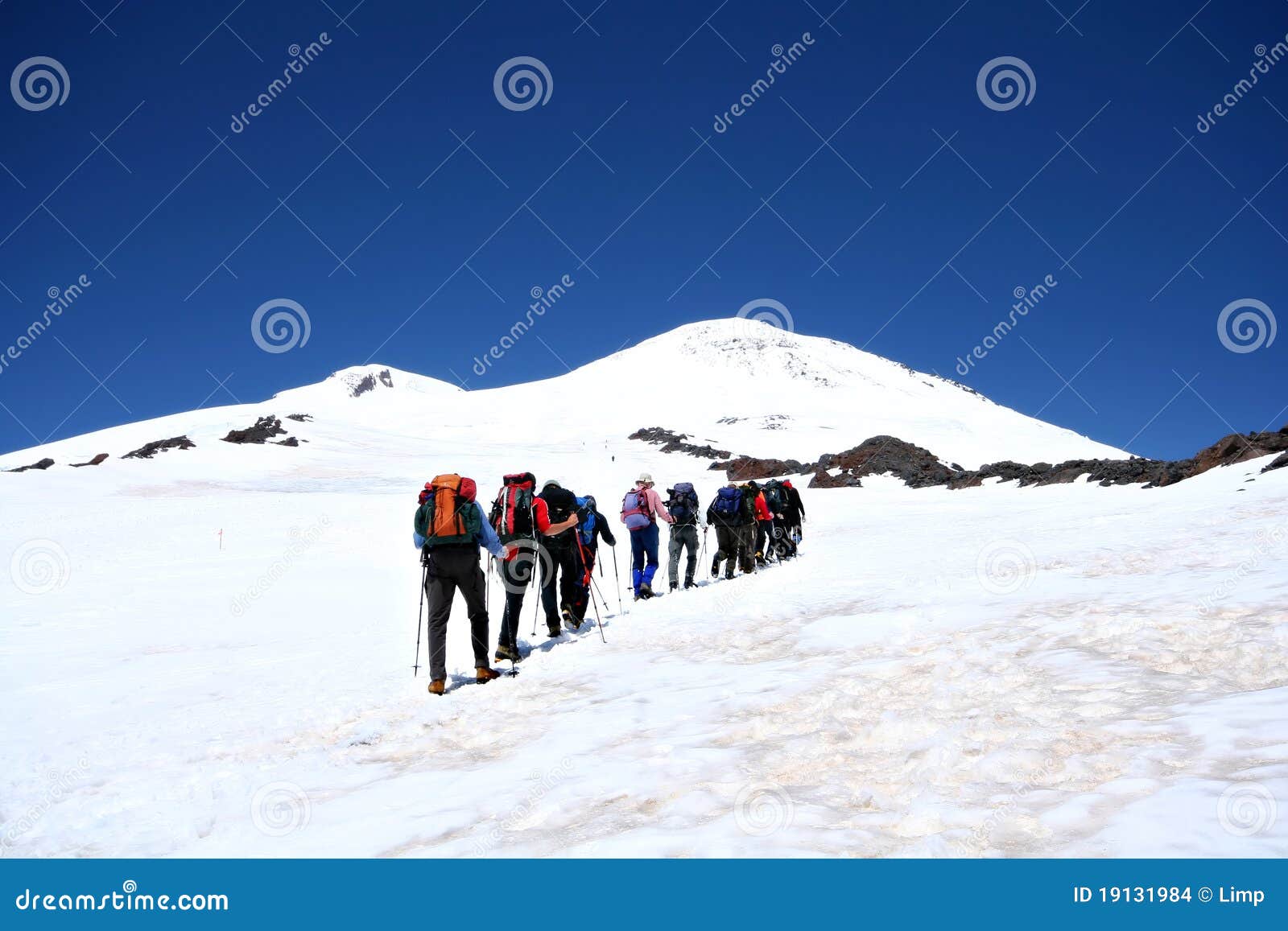 alpinists at the elbrus climbing in caucasus.