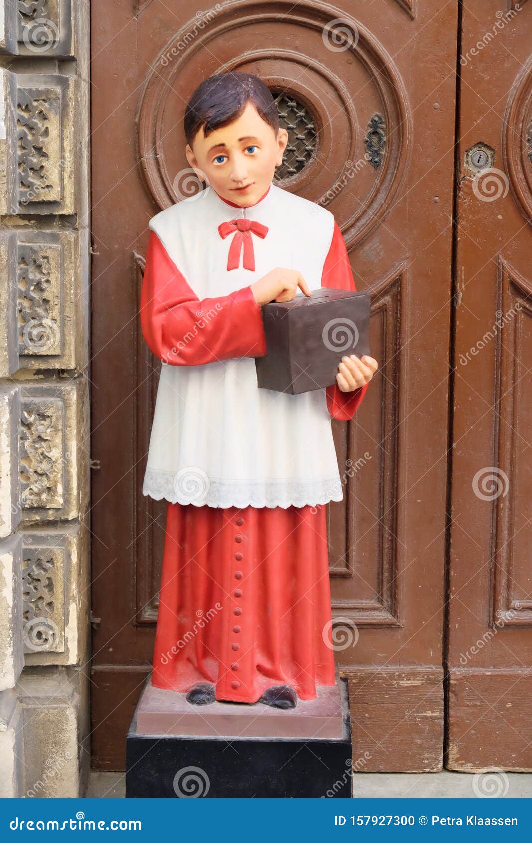 Altar Boy statue stock photo. Image of grotto, torch 157927300