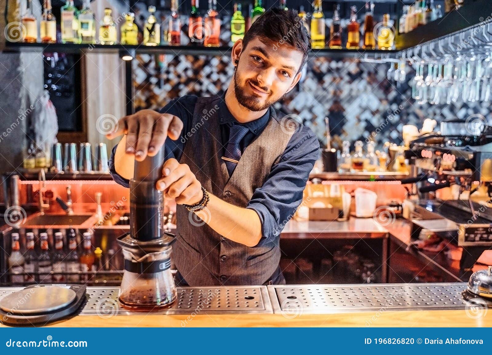 Alternative Method of Brewing Coffee. Attractive Young Barista Making