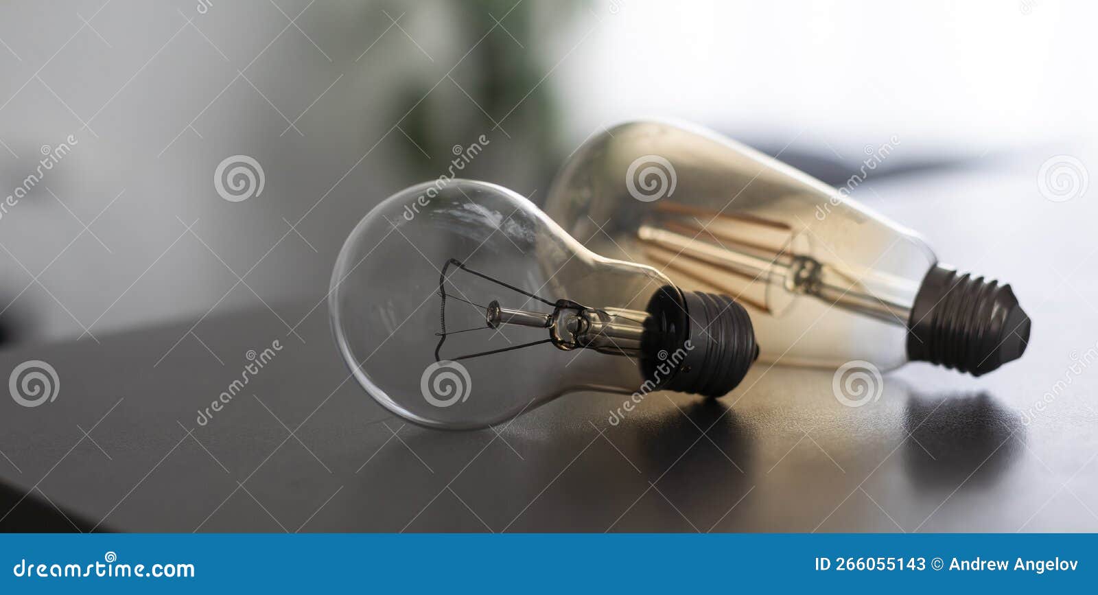 Alternative Technology Concept . Bulb and Fluorescent Bulb Comparing