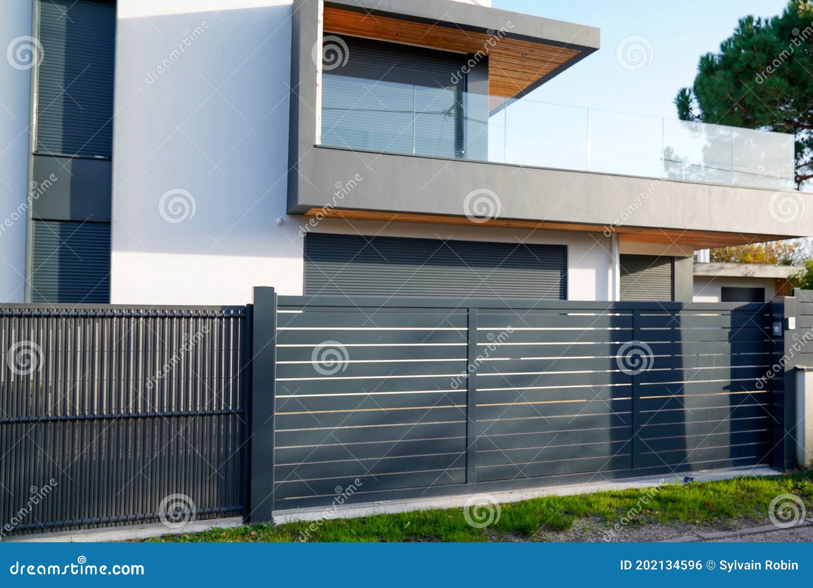 Aluminum Large Car Gate of Modern House in Street View Stock Photo