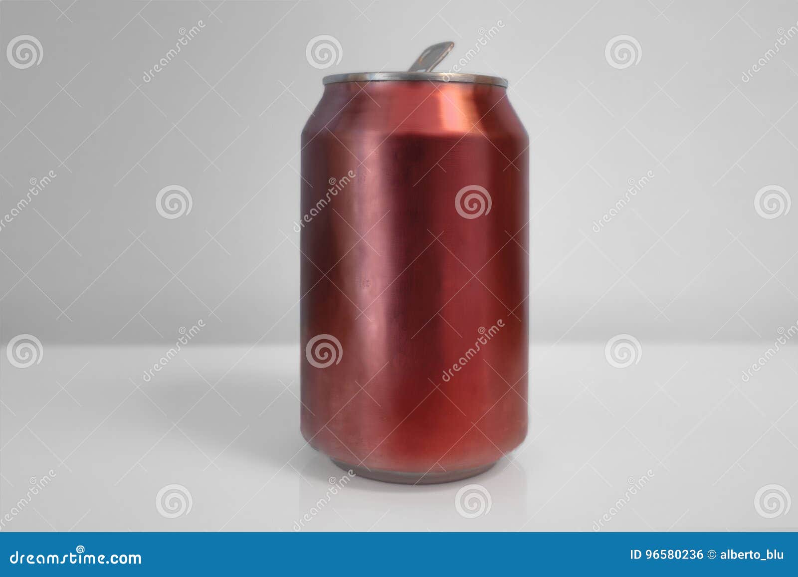 aluminum red soda can over white background