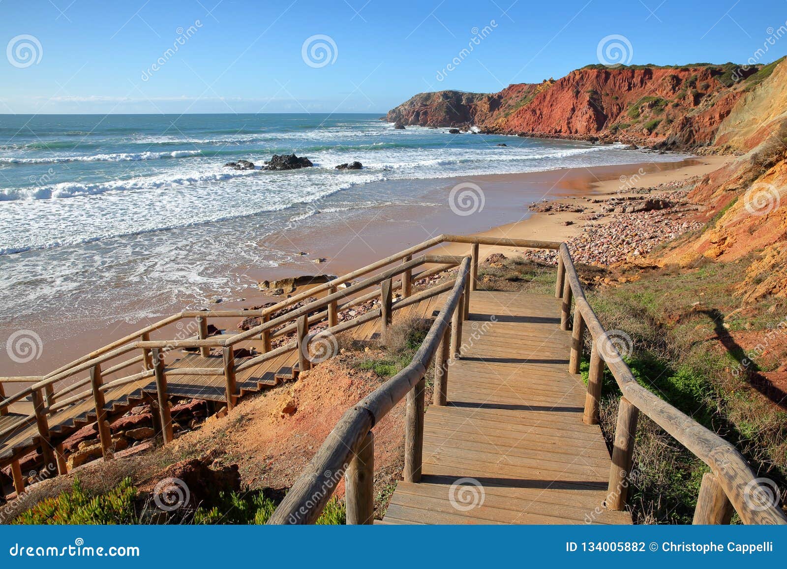 amado beach near carrapateira, with colorful landscape and dramatic cliffs, costa vicentina, algarve