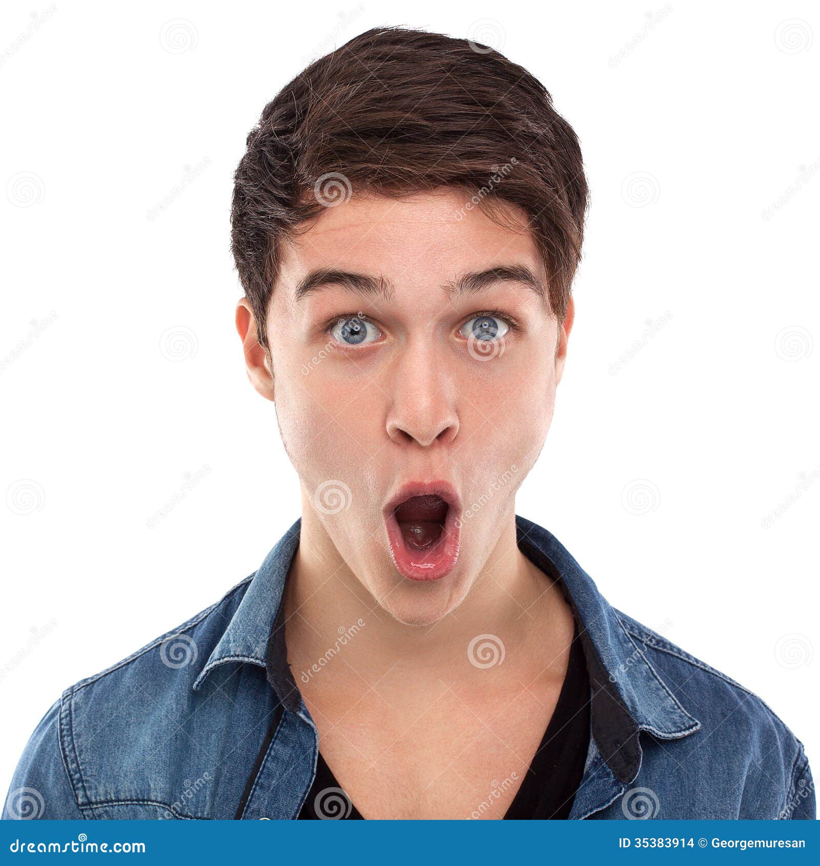 Amazed young man. Young man with open mouth and large eyes