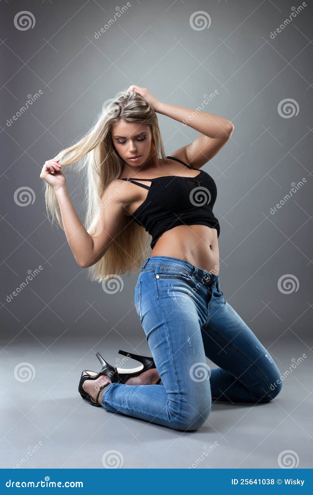 Amazingy Woman Posing In Black And Jeans Royalty Free 