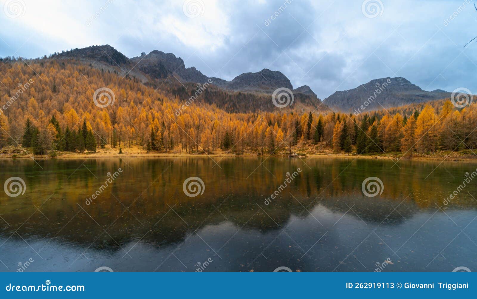 amazing autumn landscape on mountians lake. dolomites italy