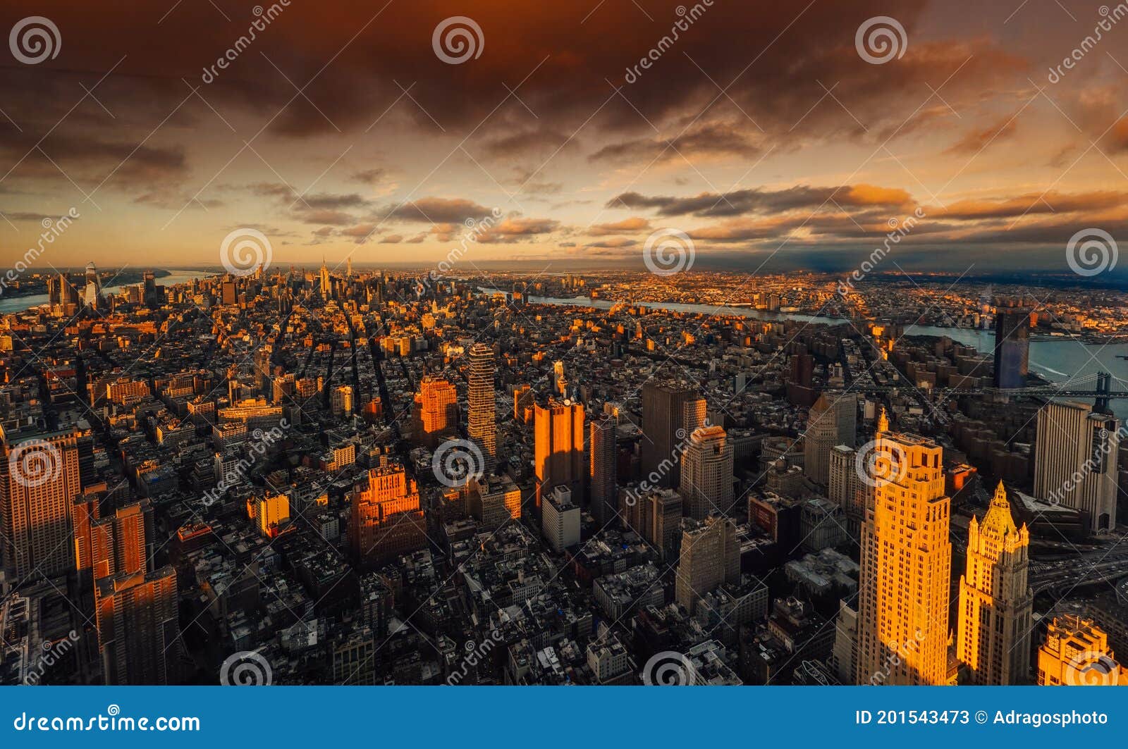 amazing autumn sunset view from one world trade center sky scraper in new york to south manhattan with great colors