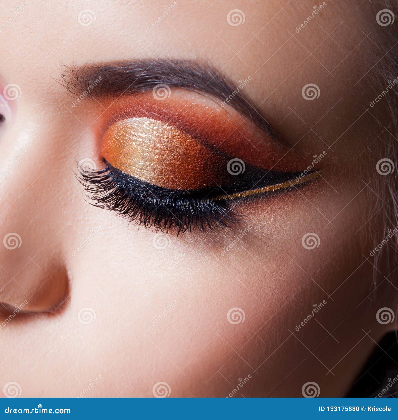 Amazing Bright Eye Makeup with a Spectacular Arrow. Brown and Gold Tones, Colored Eyeshadow Stock - Image of 133175880