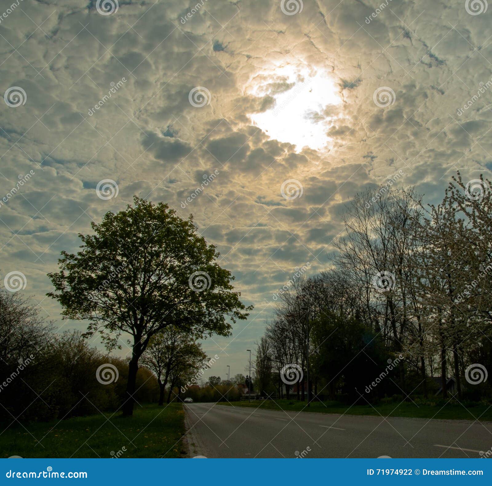 amazing clouds in a morning road