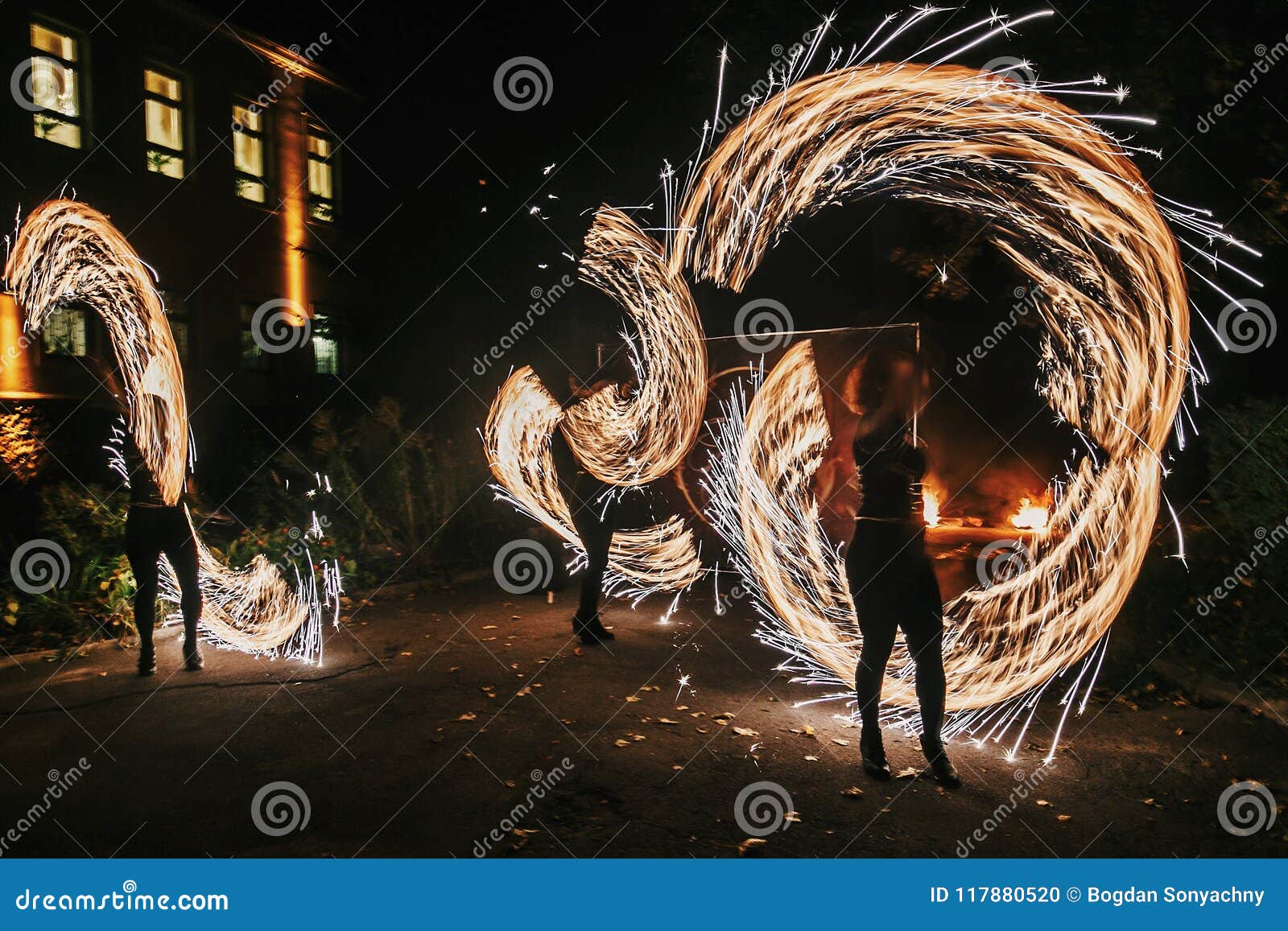 amazing fire show at night at festival or wedding party. fire da