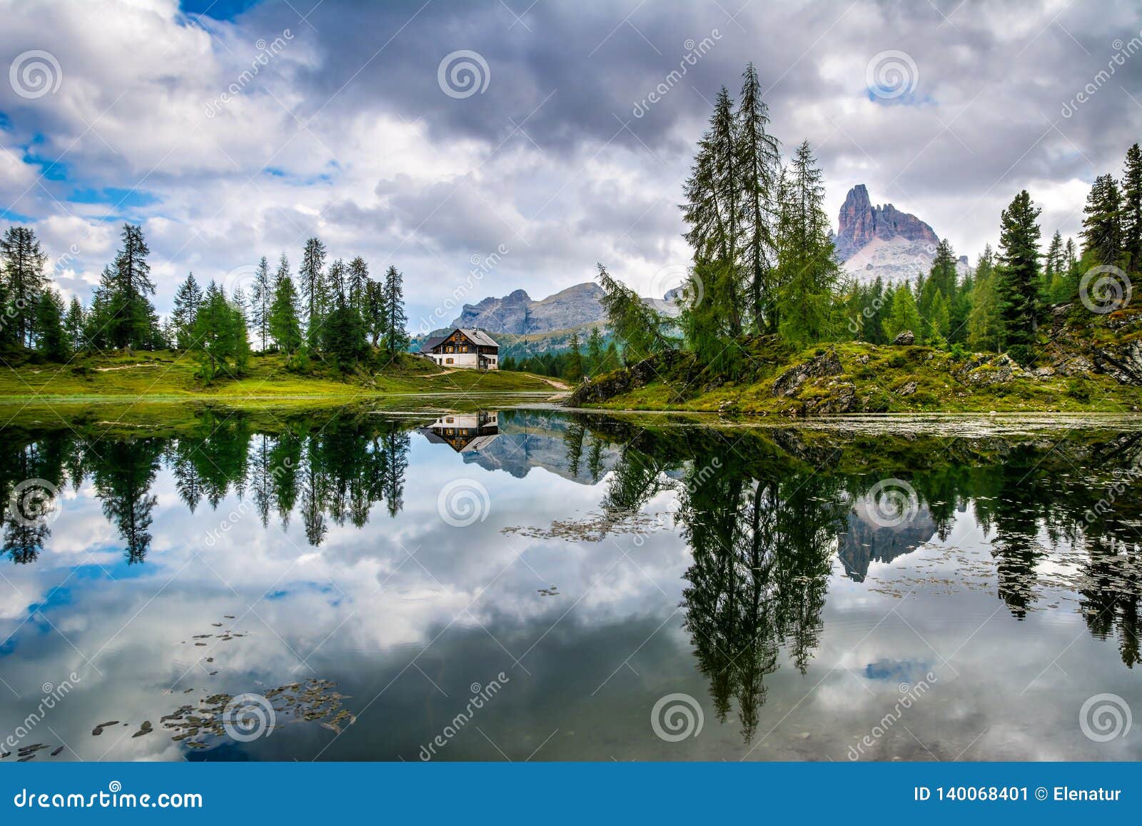 amazing lago di federa see with beautiful reflection. majestic landscape with dolomites peak, cortina d`ampezzo, south tyrol,