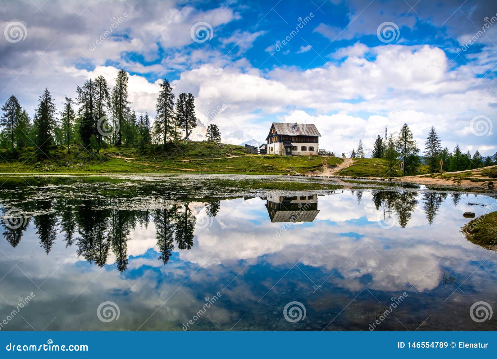 amazing lago di federa see with beautiful reflection. majestic landscape with dolomites peak, cortina d`ampezzo, south tyrol,