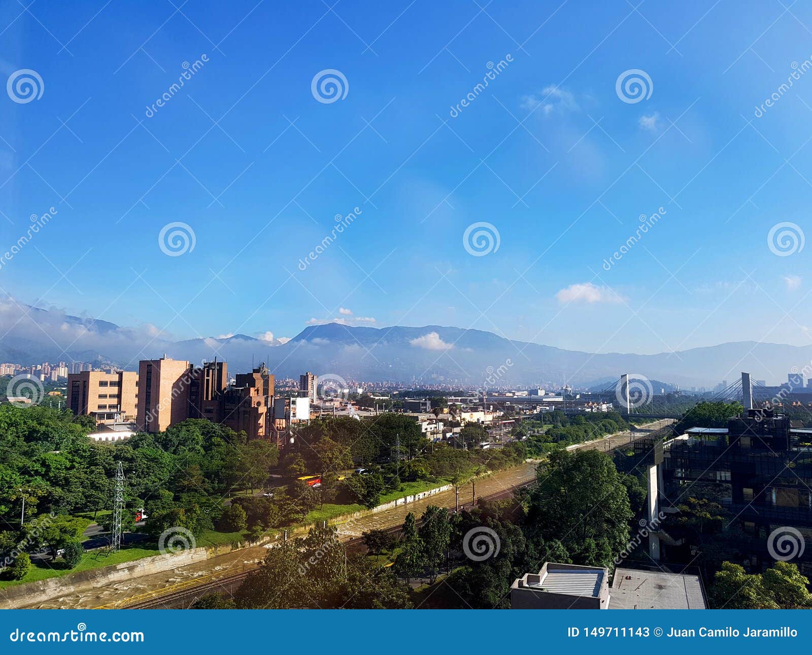 amazing panoramic view or landscape of the city of medellin in colombia, with skybuildings and parks of el poblado town