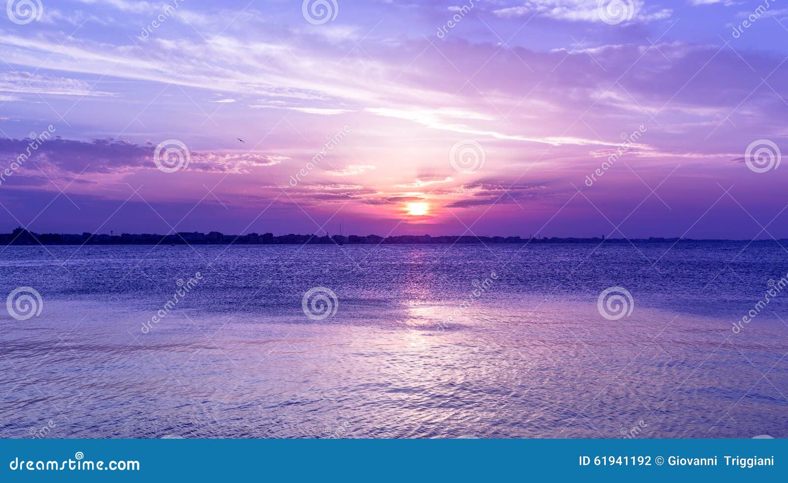 amazing purple sky sunset over sea . dusk on adriatic sea.