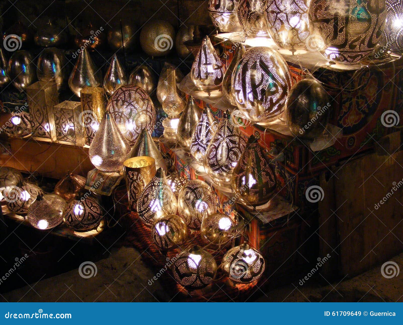 amazing shining lanterns in khan el khalili souq market with arabic handwriting on it in egypt cairo