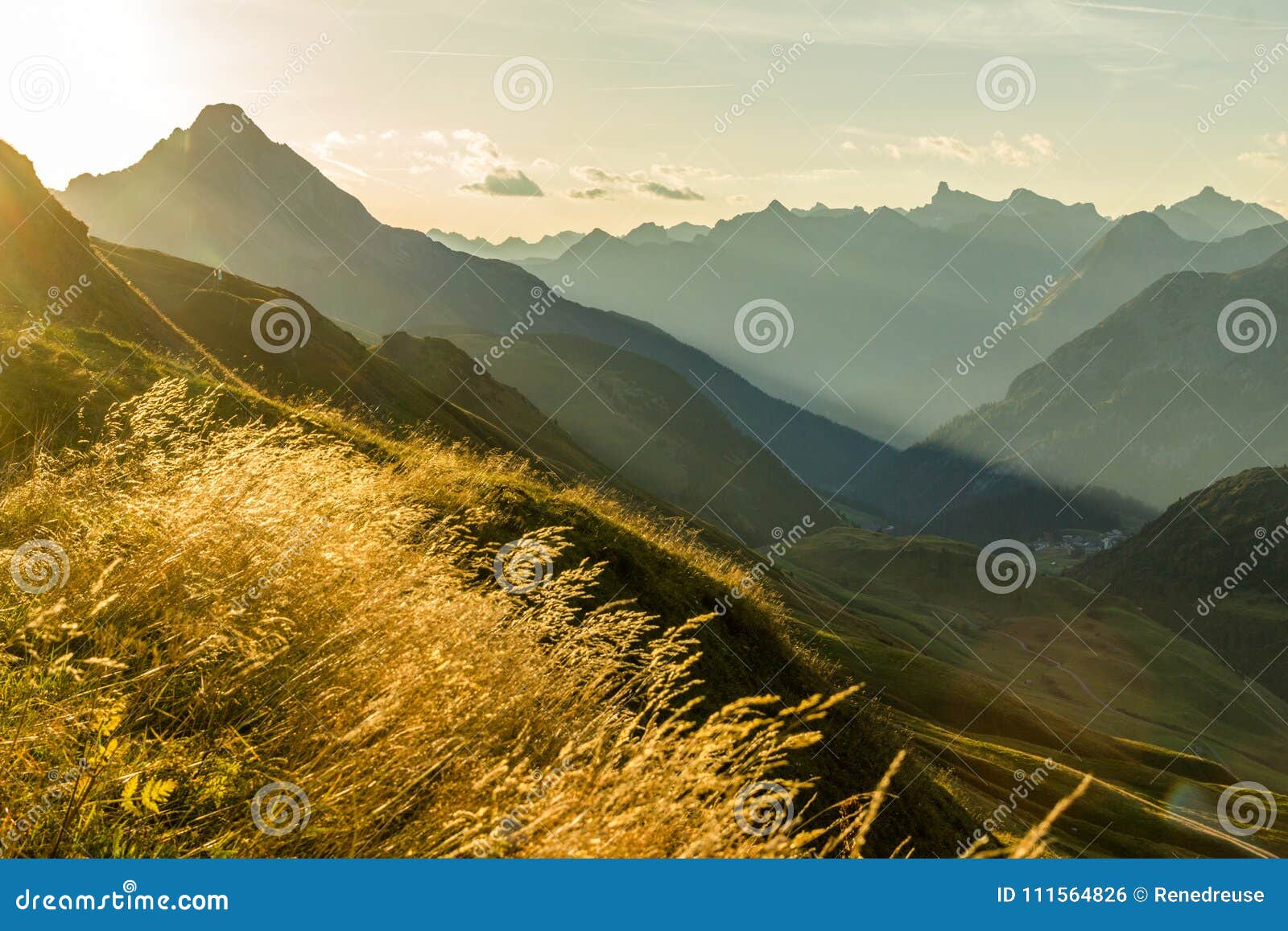 beautiful sunrise and layered mountain silhouettes in early morning. lechtal and allgau alps, bavaria and austria.