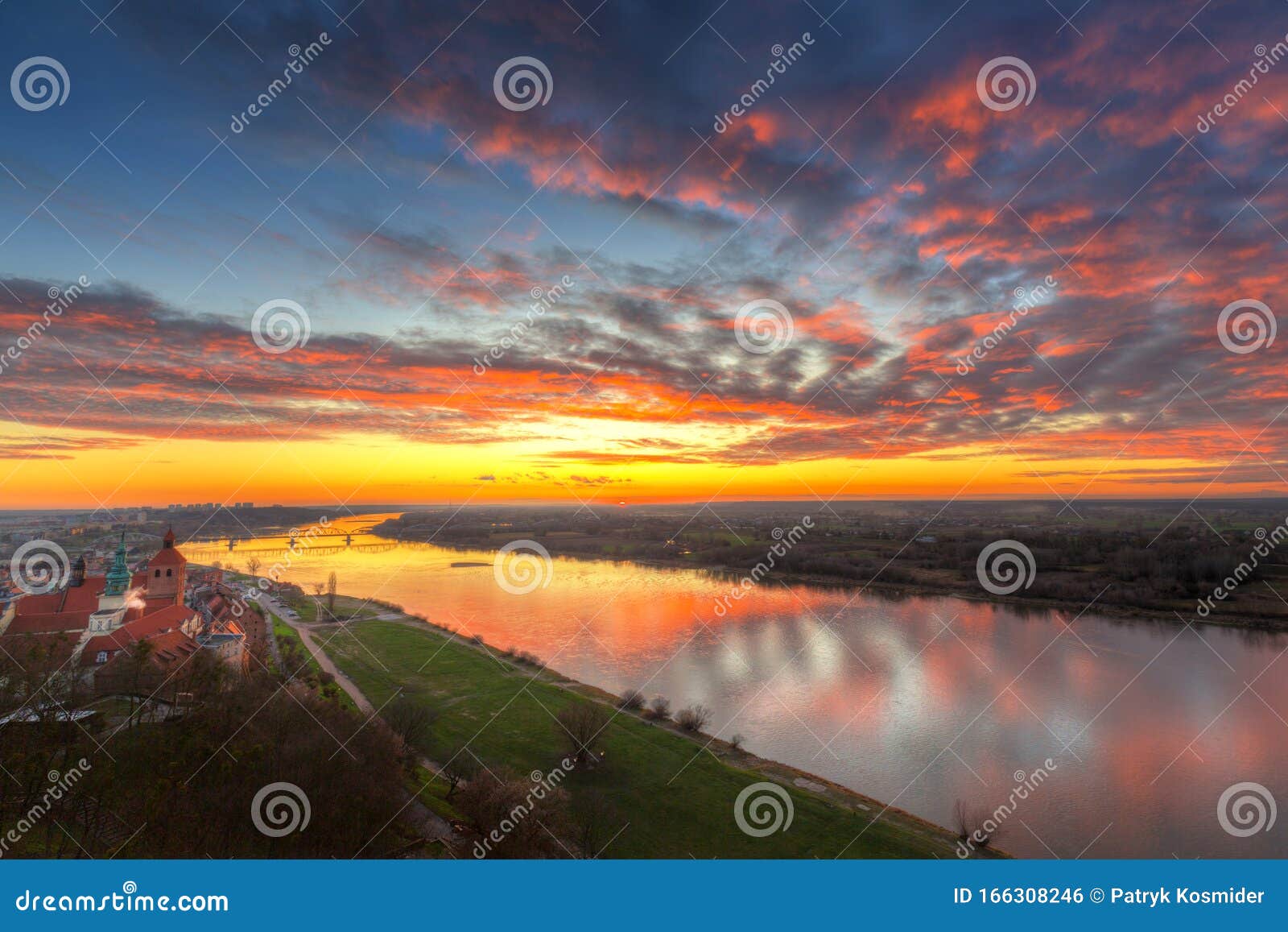 amazing sunset over grudziadz city and the vistula river, poland