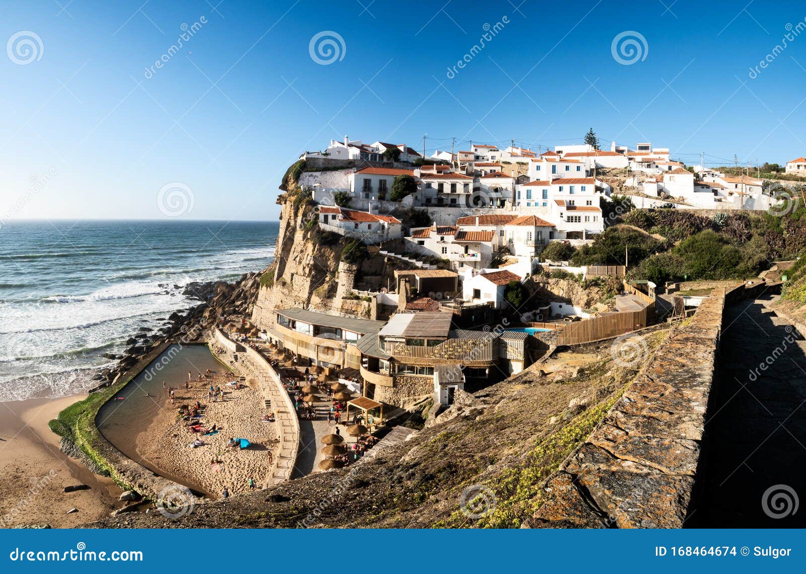 town on a sun-drenched cliff near colares