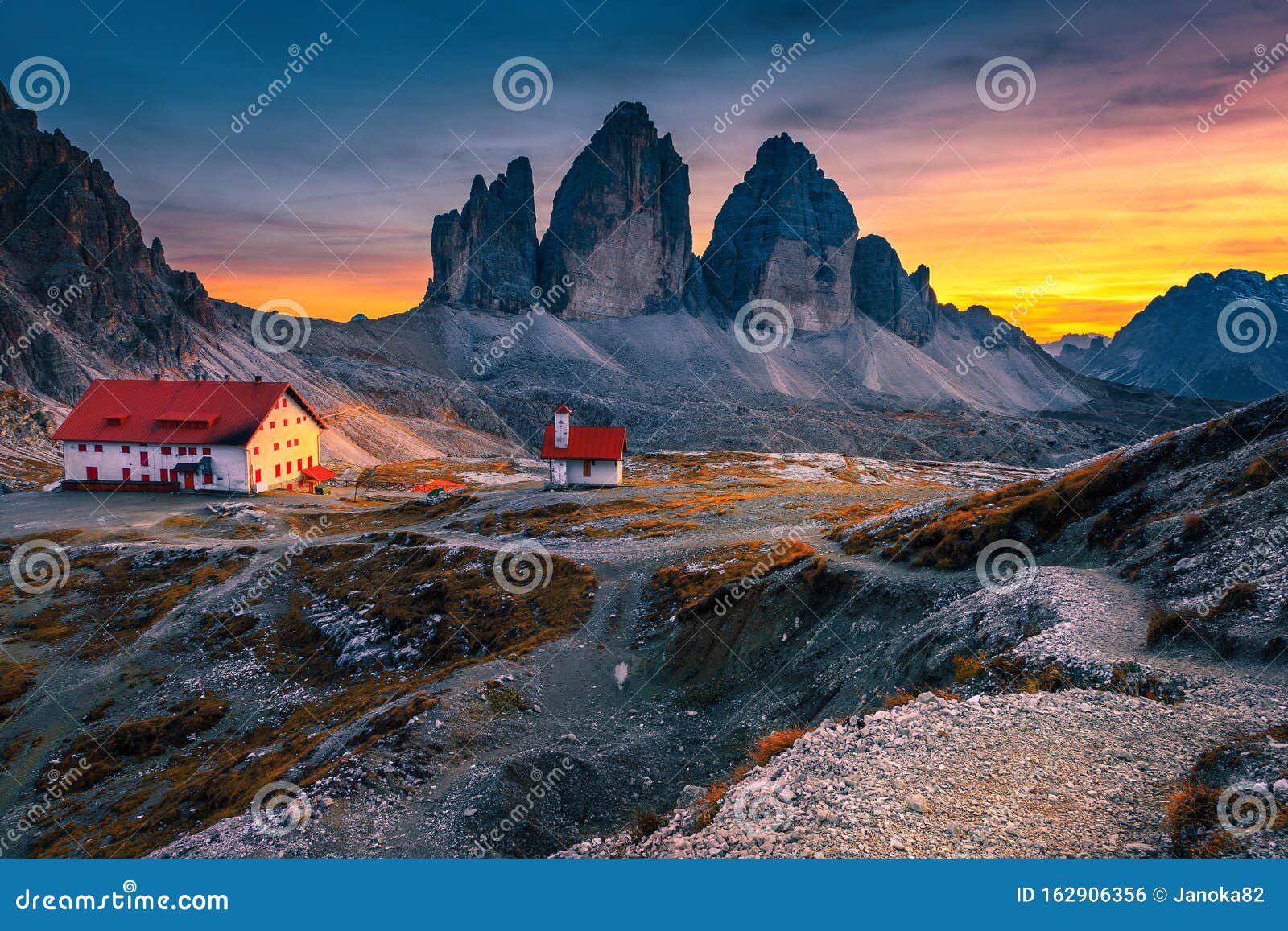 amazing tre cime di lavaredo mountains at sunset, dolomites, italy