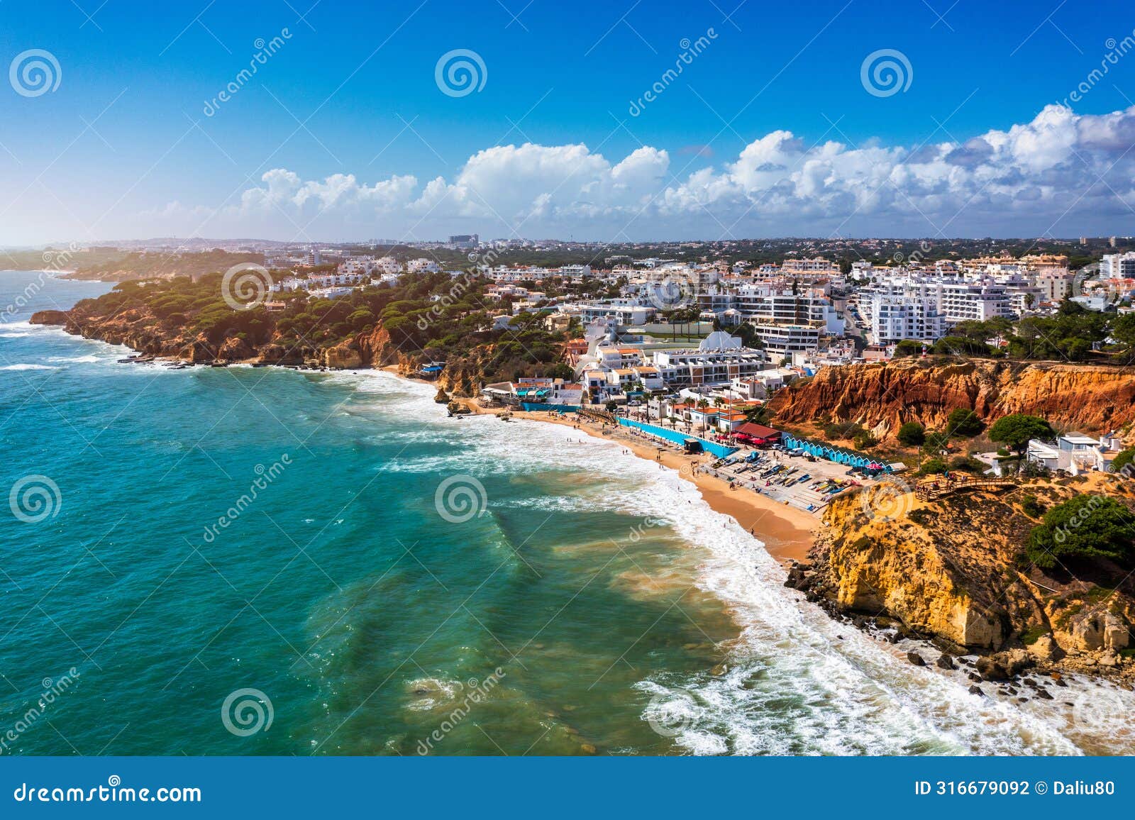 amazing view from the sky of town olhos de agua in albufeira, algarve, portugal. aerial coastal view of town olhos de agua,