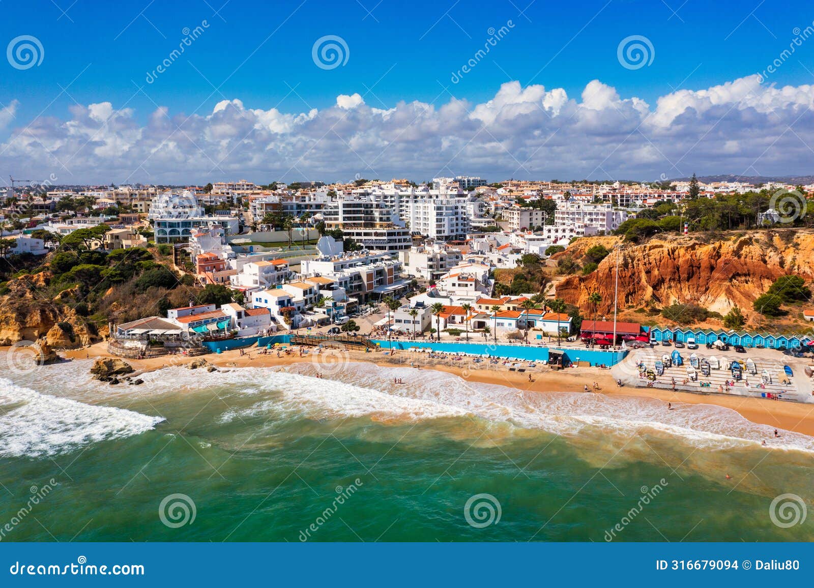 amazing view from the sky of town olhos de agua in albufeira, algarve, portugal. aerial coastal view of town olhos de agua,