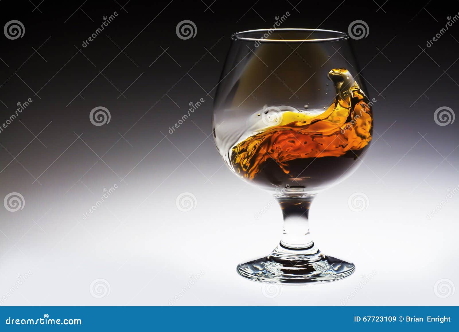 Amber Alcohol Drink Splash in Glass Stock Image Image of motion