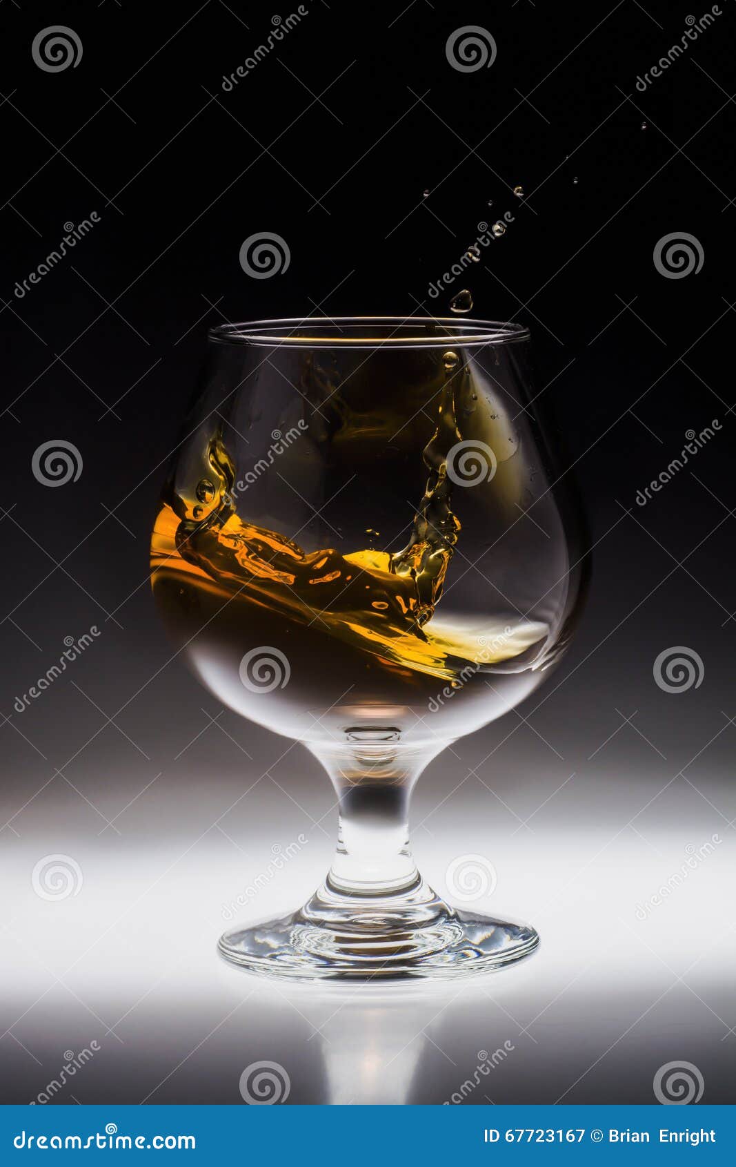 Amber Alcohol Drink Splash in Glass Stock Image Image of object