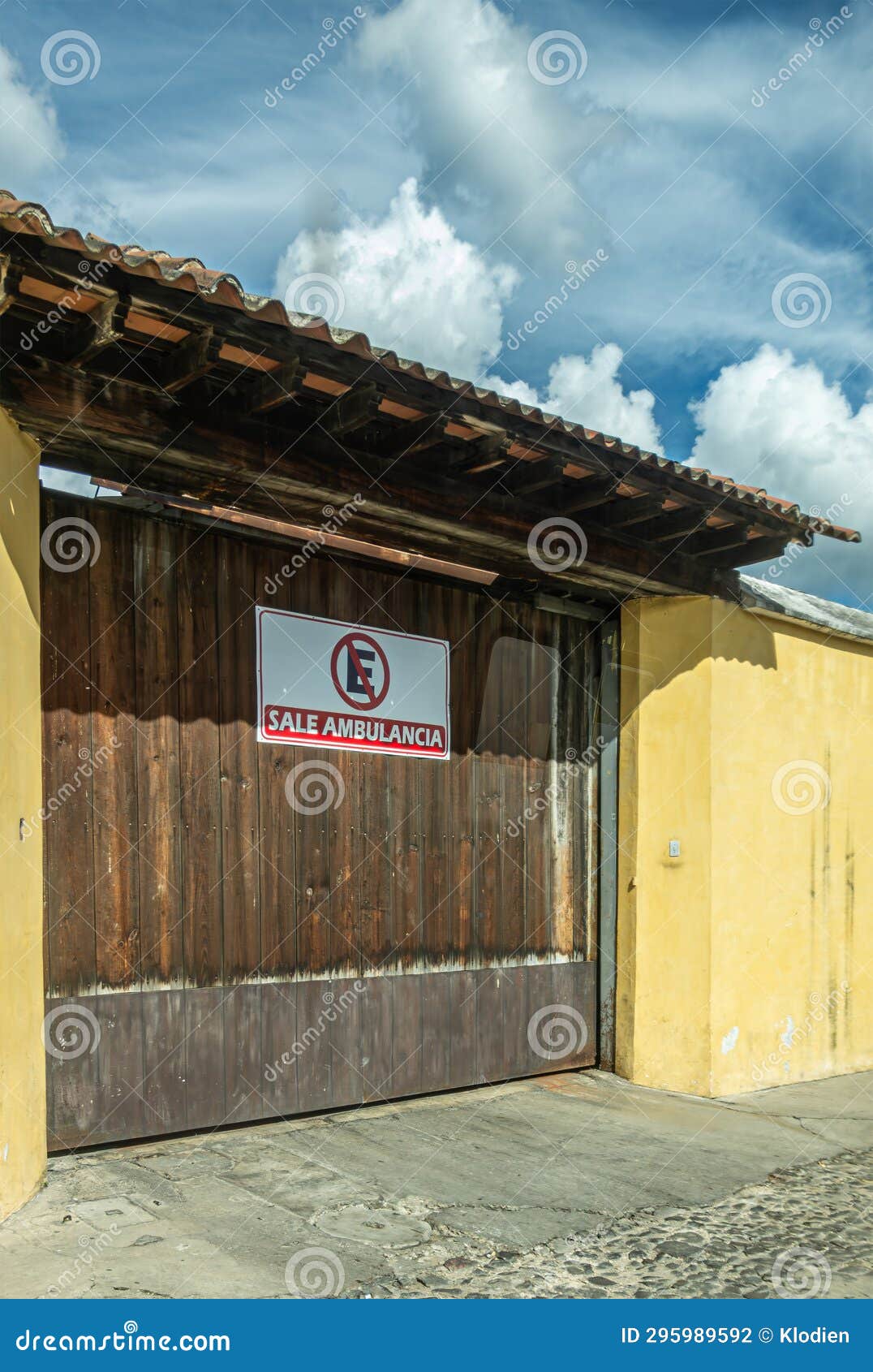 ambulance exit sign on gate, la antigua, guatemala